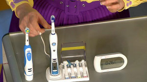Como usar uma escova de dentes elétrica